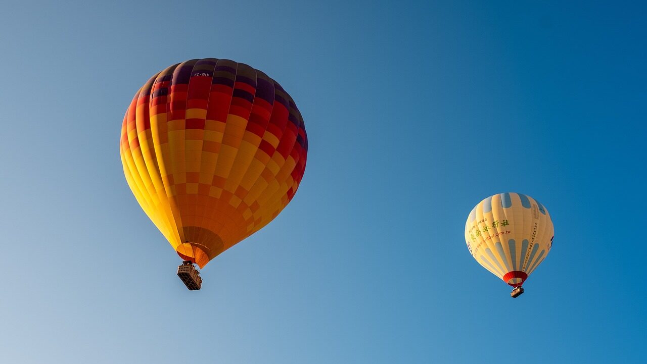 hot air balloons, sky, sunrise-4561263.jpg