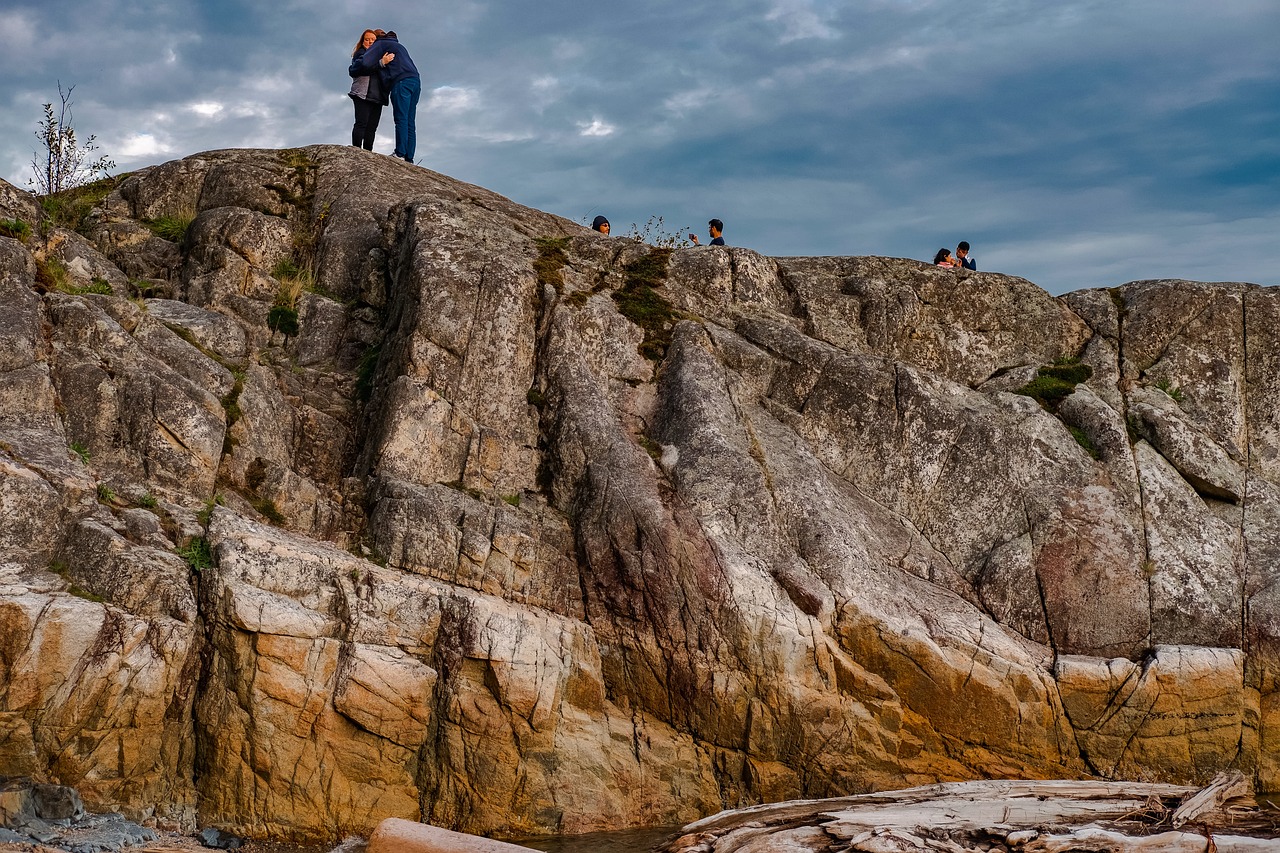 stones, cliff, people-7466631.jpg